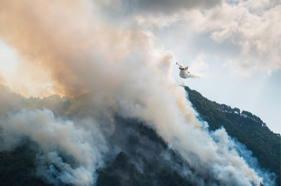 Firefighting airplane water drop.